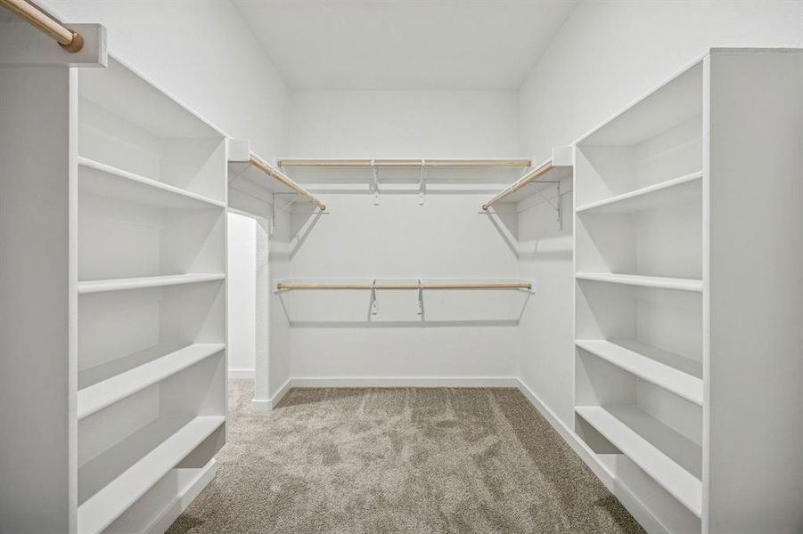 Primary Closet in the Wimbledon home plan by Trophy Signature Homes – REPRESENTATIVE PHOTO