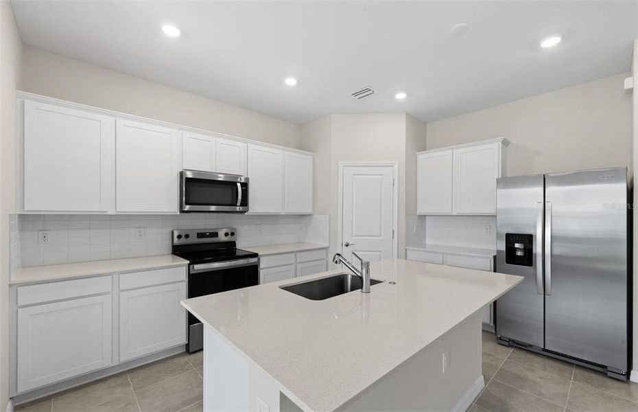 Furnished interior view inside a new home in The Strand at Cedar Grove, North Port (Image 7).