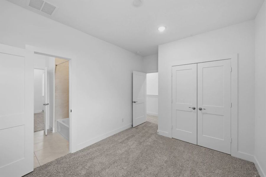 Representative unfurnished interior of a home built from the Cheverny by Chesmar Homes in Bridgeland Chateau, Cypress (Image 39).