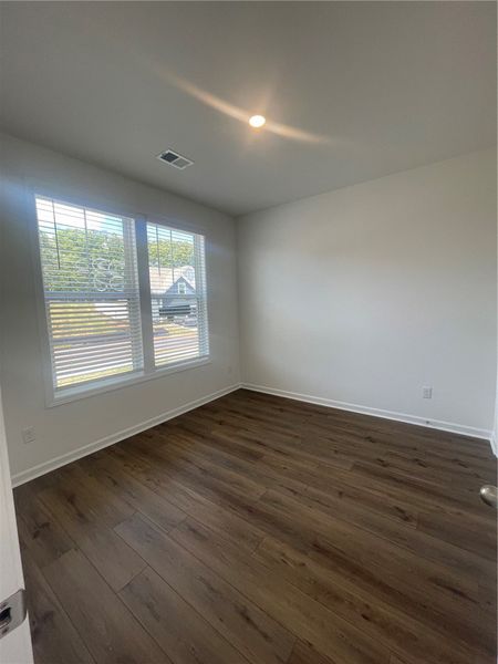 Spacious, unfurnished interior of a new home in Springwood Grove, Central (Image 28).