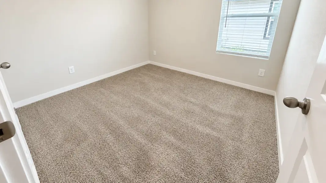Spacious, unfurnished interior of a new home in Flagstop Crossing, Odem (Image 16).