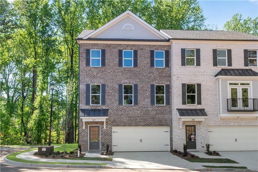 Front exterior of a new home in , Suwanee, GA, highlighting curb appeal (Image 1). Front exterior of a new home in , Suwanee, GA, highlighting curb appeal (Image 1).
