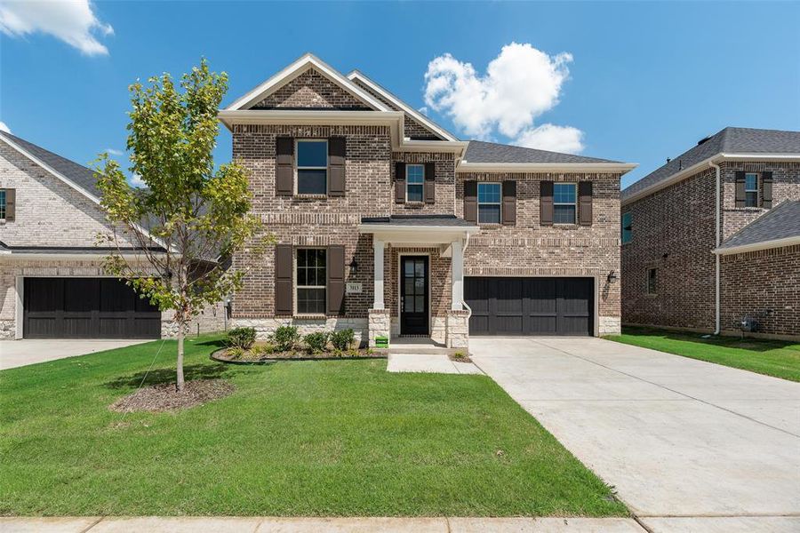 Front exterior of a new home in Arbors at Legacy Hills, Celina, TX, highlighting curb appeal (Image 1).