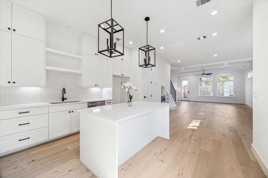 Spacious and airy living area with designer finishes and seamless flow. Spacious and airy living area with designer finishes and seamless flow.