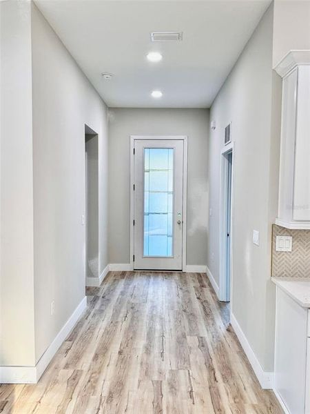 Spacious Foyer, 8' tall glass door