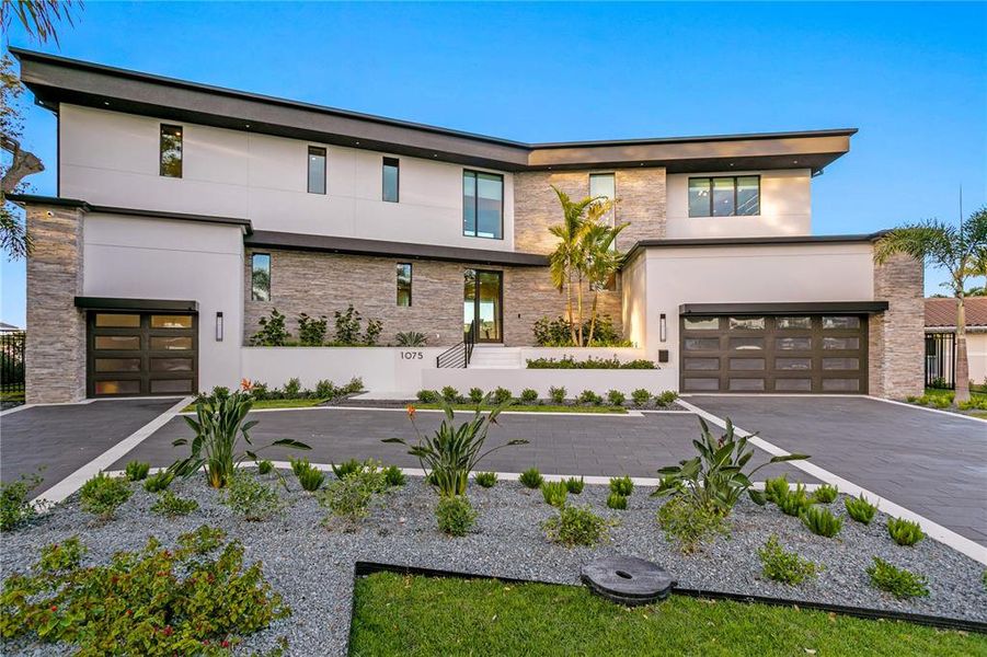 Front exterior of a new home in , St. Petersburg, FL, highlighting curb appeal (Image 1). Front exterior of a new home in , St. Petersburg, FL, highlighting curb appeal (Image 1).
