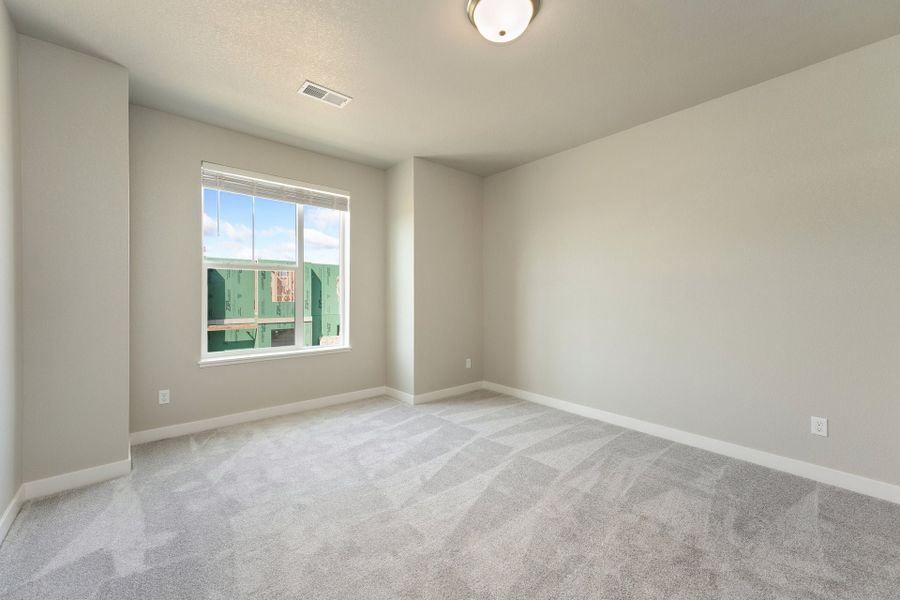 Spacious, unfurnished interior of a new home in The Lakes at Centerra, Loveland (Image 23).