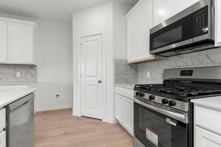 Furnished interior view inside a new home in Tamarron, Fulshear (Image 8).