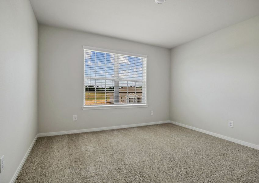 Third bedroom with a large window Third bedroom with a large window