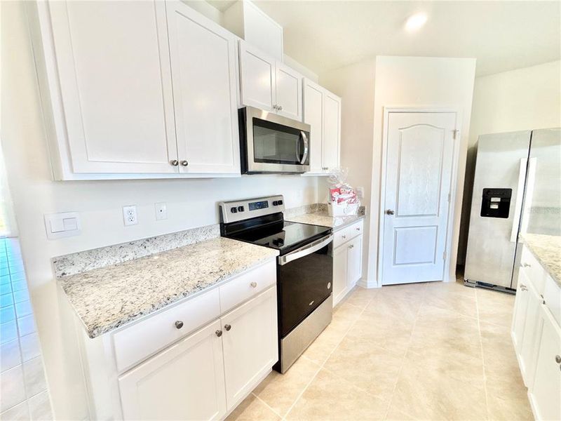 Furnished interior view inside a new home in Cascades, Davenport (Image 4).