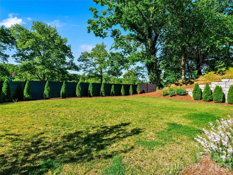 Rare level, private yard.
