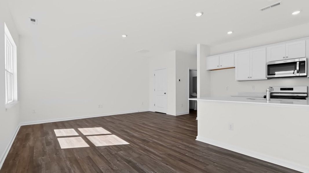 Spacious, unfurnished interior of a new home in The Townes at Honeycutt Oaks, Angier (Image 11). Spacious, unfurnished interior of a new home in The Townes at Honeycutt Oaks, Angier (Image 11).