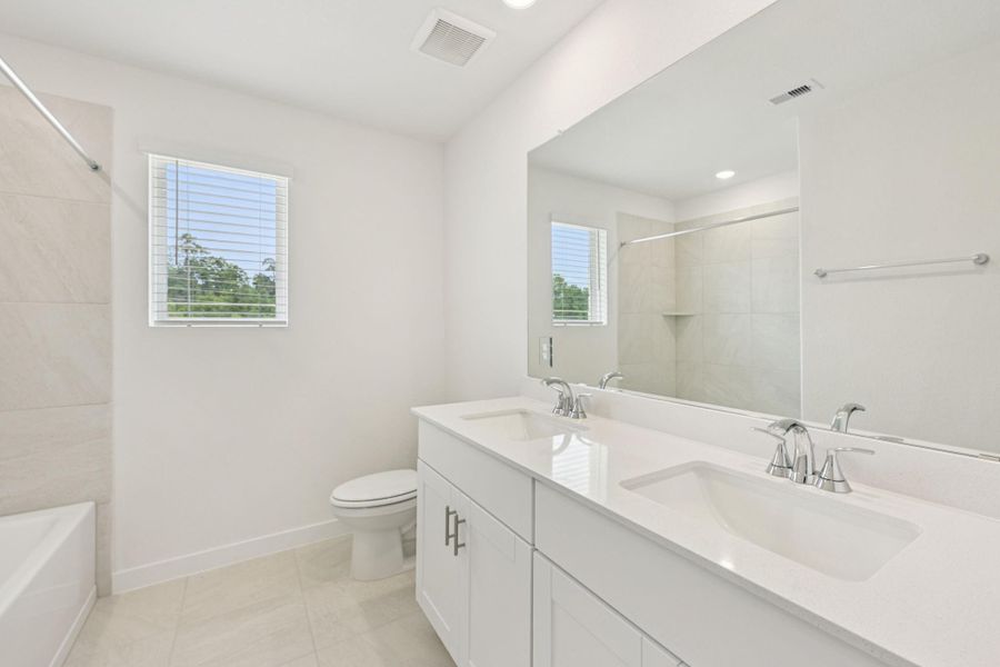 Furnished interior view inside a new home in Pine Lake Cove - Traditional Series, Montgomery (Image 4).