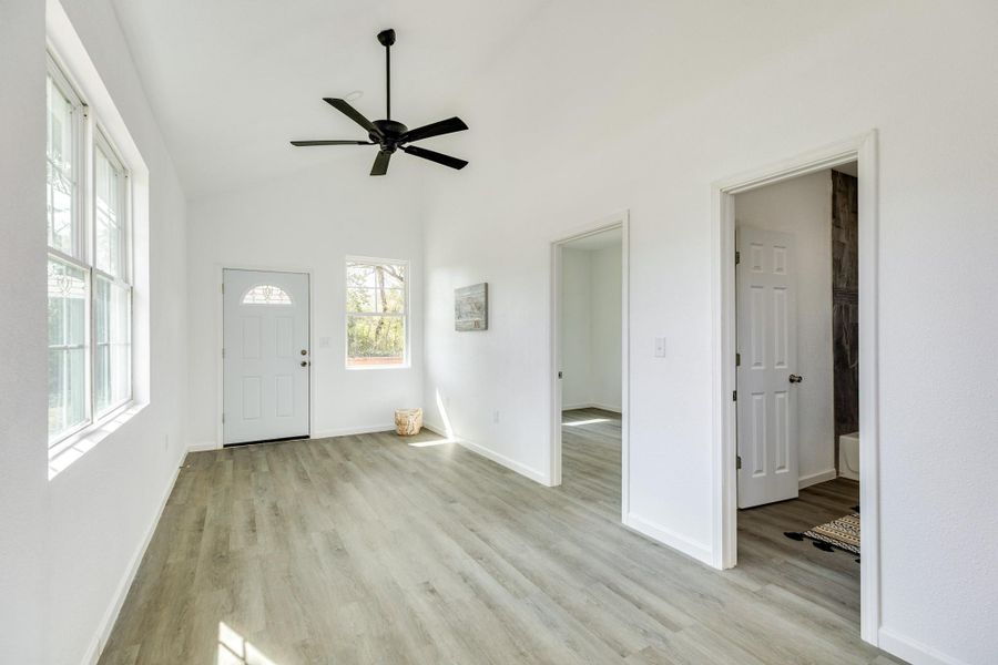 Bright and cozy living space with natural light and an open layout.