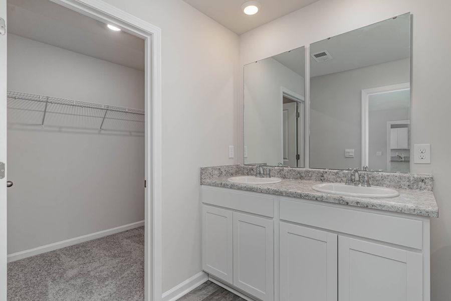Representative furnished interior of a home built from the CURTIS by D.R. Horton in Auberon Woods, Conway (Image 9).