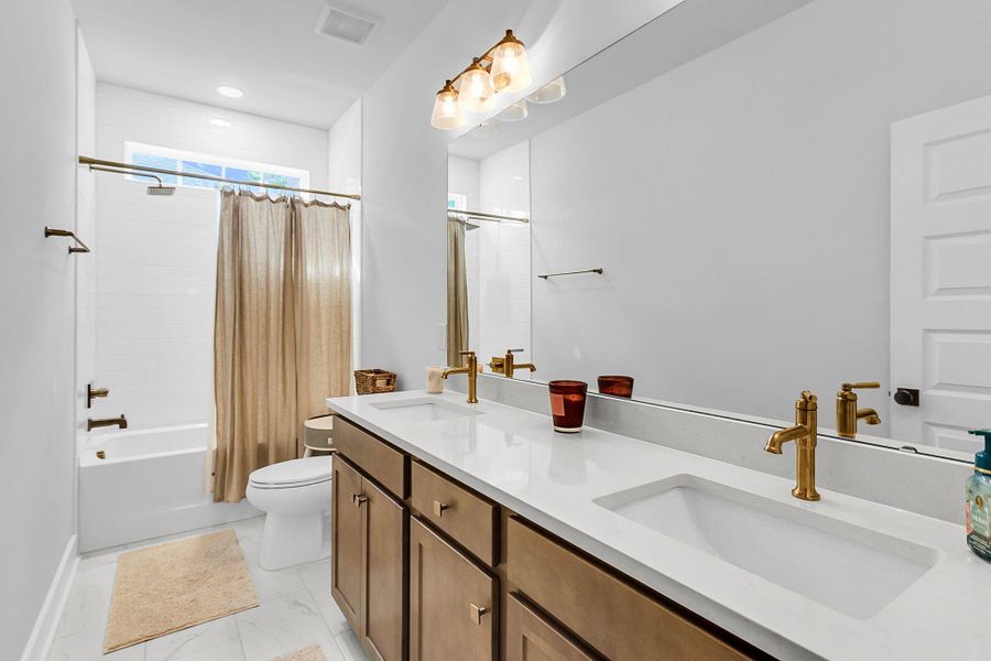 Furnished interior view inside a new home in Fiddler Cove, Mount Pleasant (Image 19).