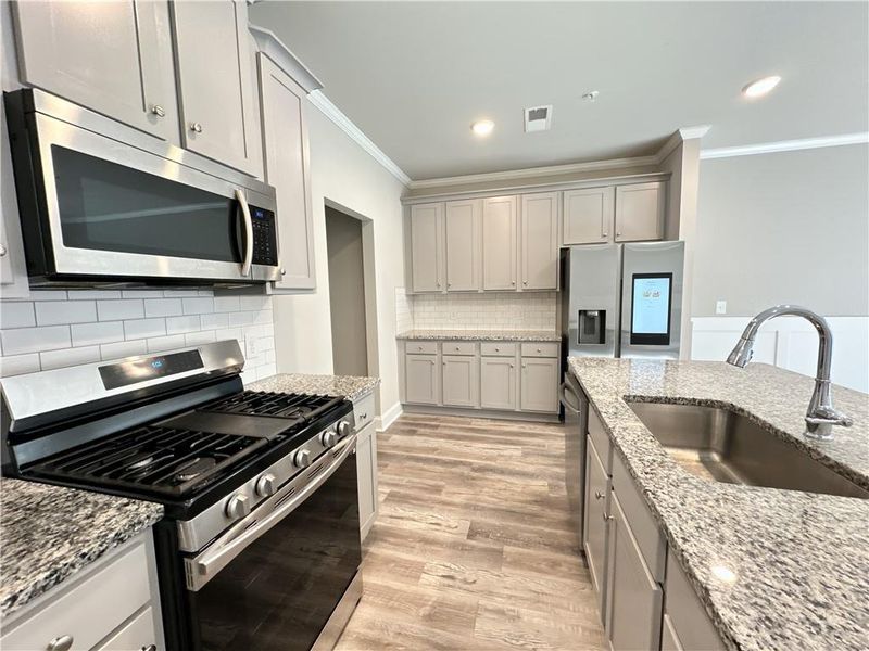 Furnished interior view inside a new home in , Woodstock (Image 4).