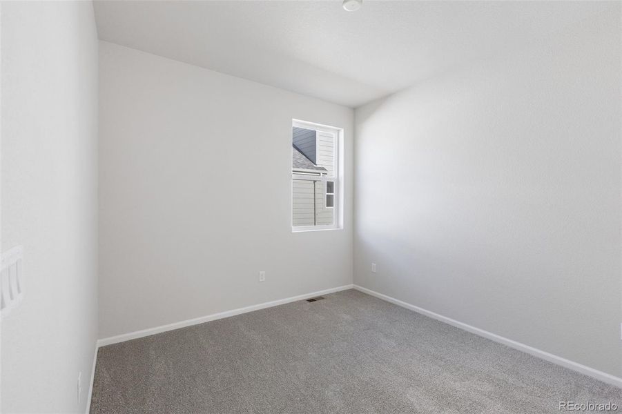 Spacious, unfurnished interior of a new home in The Legacy Collection at Talon Pointe, Thornton (Image 22).