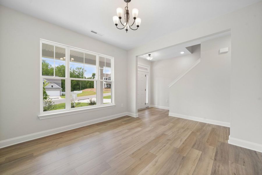 Spacious, unfurnished interior of a new home in Cottages at Piper Village, Trinity (Image 15).