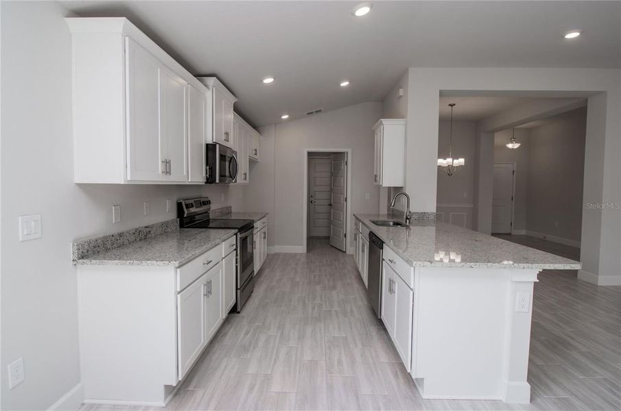 Representative furnished interior of a home built from the 1970 by Adams Homes in Winding Oaks, Weeki Wachee (Image 5).