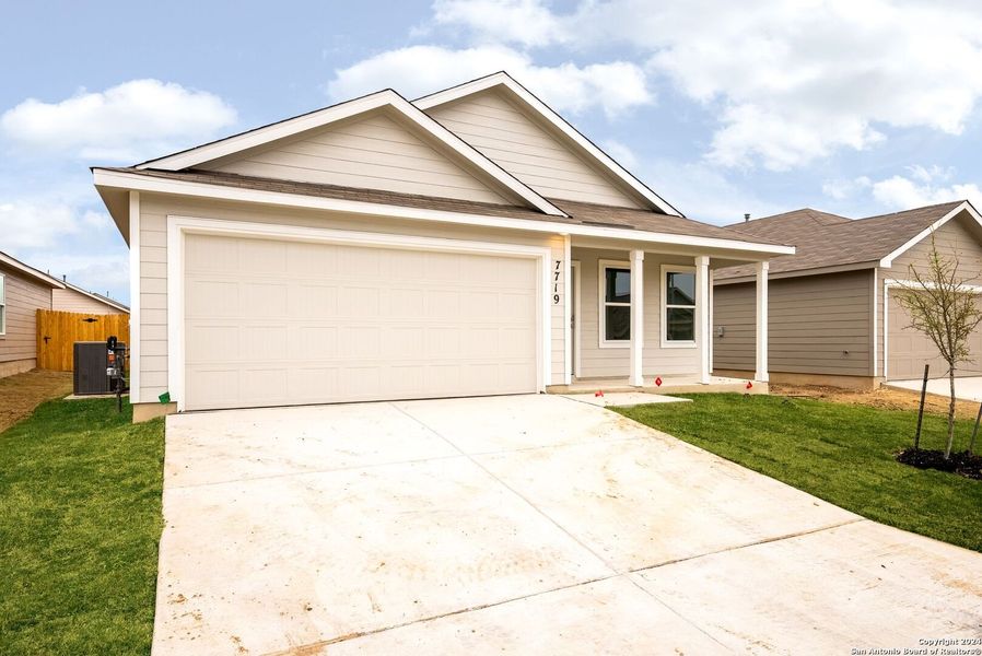 Front exterior of a new home in Torian Village, San Antonio, TX, highlighting curb appeal (Image 14). Front exterior of a new home in Torian Village, San Antonio, TX, highlighting curb appeal (Image 14).