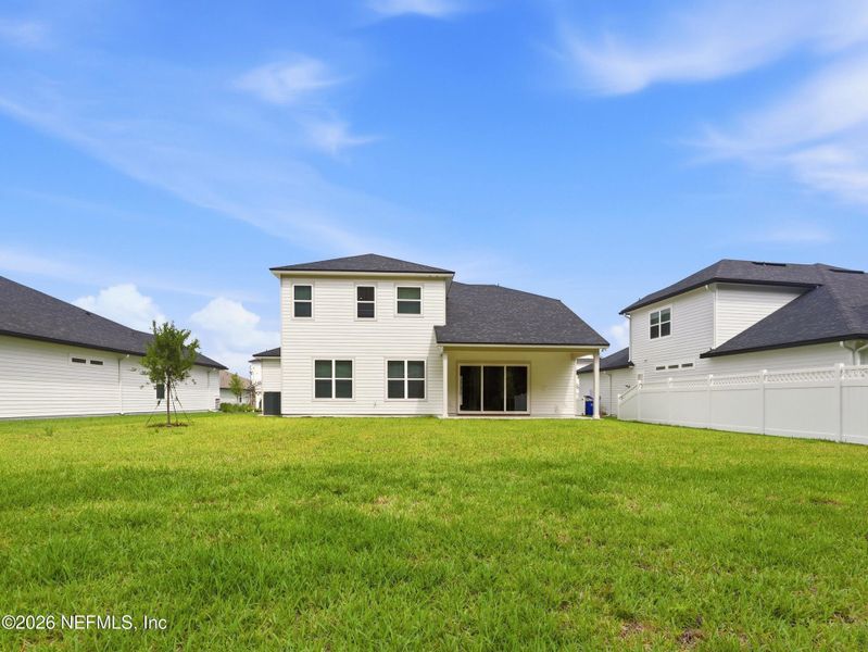 Exterior details and patio area of a home in Silver Landing At Silverleaf, St. Augustine (Image 31).