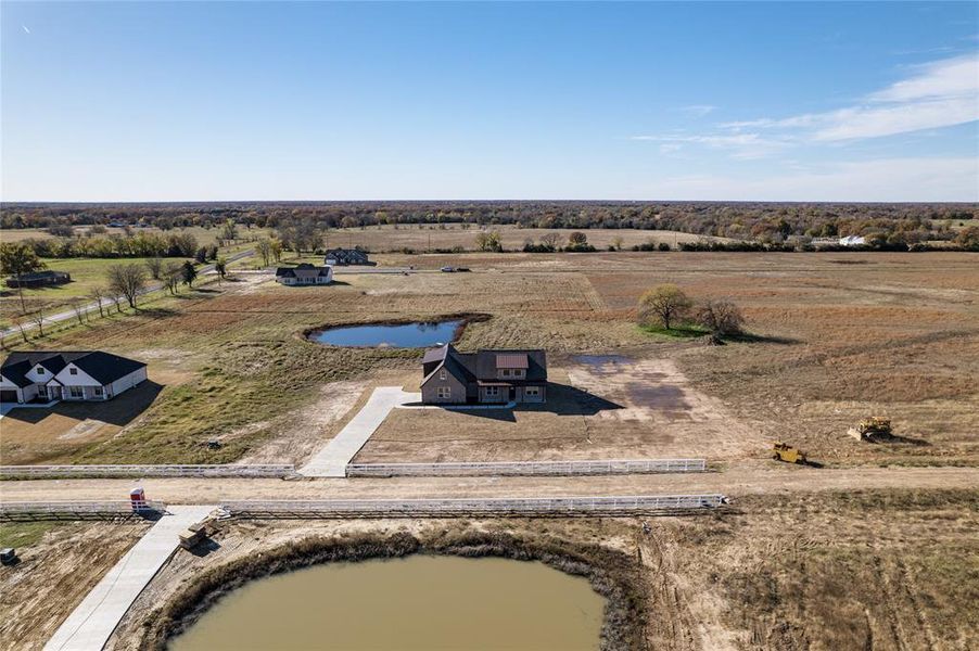 Front exterior of a new home in , Brashear, TX, highlighting curb appeal (Image 28).