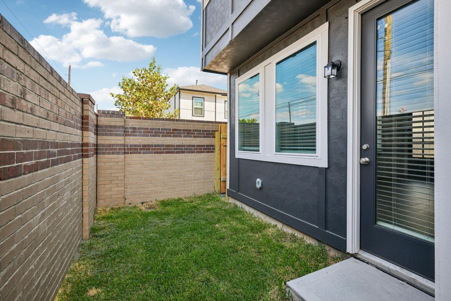 Exterior details and patio area of a home in Spring Brook Village - City Series, Houston (Image 3).