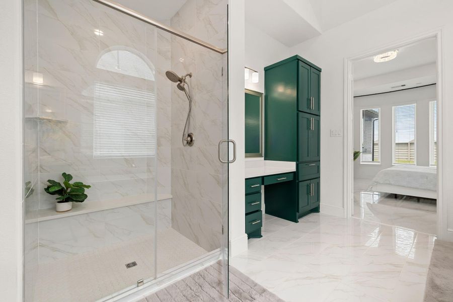 Walk-in shower and bath area with clean finishes and an upscale, modern feel