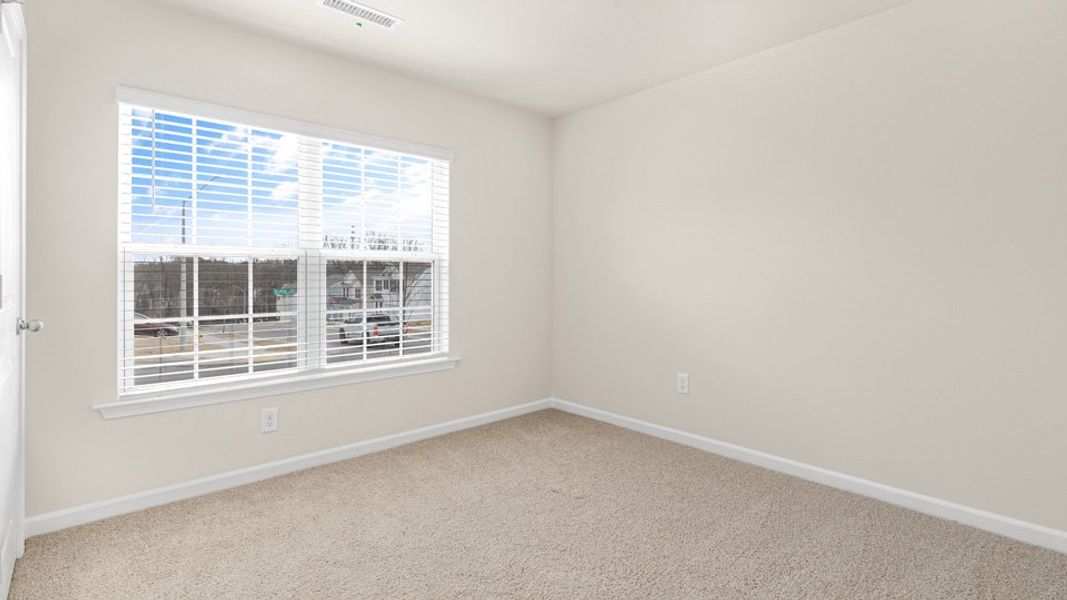 Representative unfurnished interior of a home built from the CALI by D.R. Horton in Wilson's Ridge, Wilson's Mills (Image 29).
