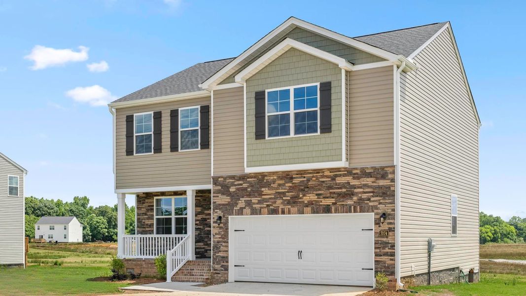 Front exterior of a new home in Aurora Acres, Snow Camp, NC, highlighting curb appeal (Image 2). Front exterior of a new home in Aurora Acres, Snow Camp, NC, highlighting curb appeal (Image 2).