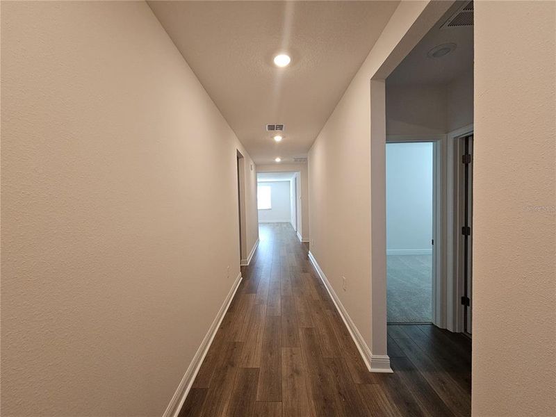 Spacious, unfurnished interior of a new home in The Reserve at Hammock Oaks - Signature Series, Lady Lake (Image 13).