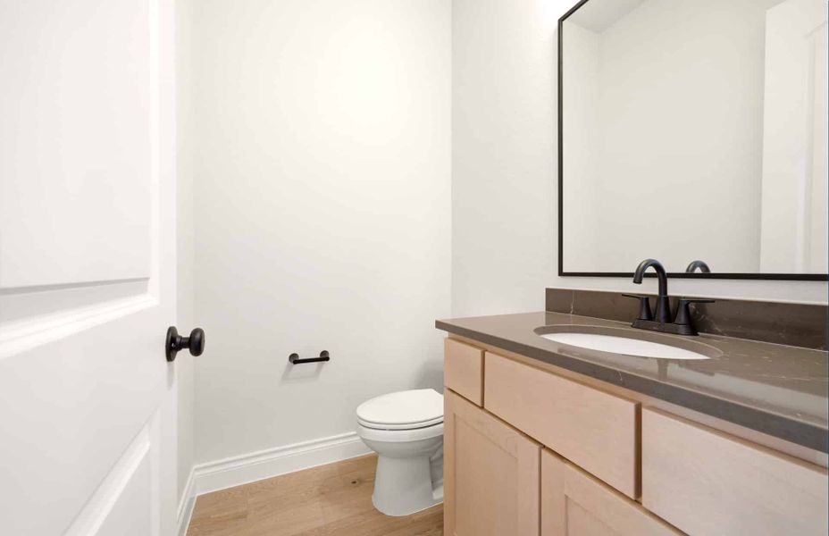 Furnished interior view inside a new home in Bridgeland 60′, Cypress (Image 12).