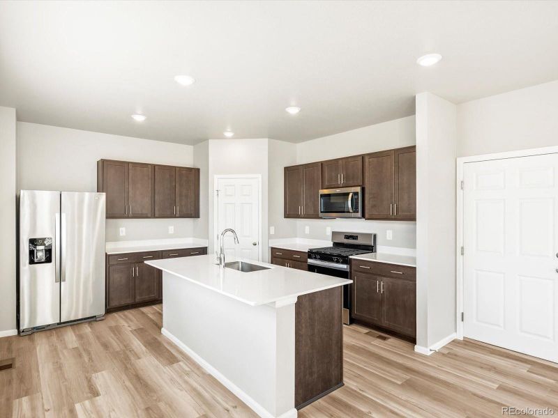 Furnished interior view inside a new home in Revere at Johnstown, Johnstown (Image 9).