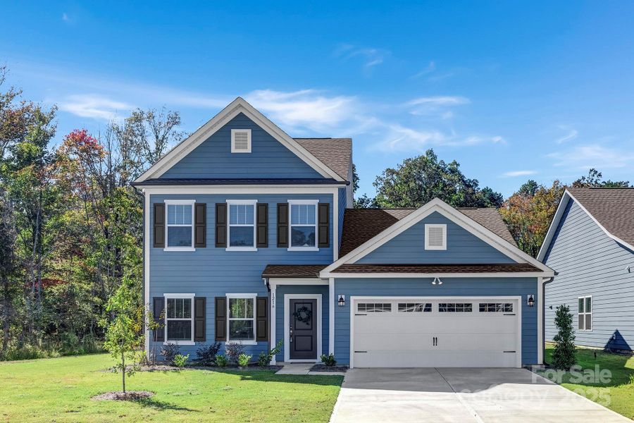 Front exterior of a new home in Stonebridge Fairways, Monroe, NC, highlighting curb appeal (Image 25).