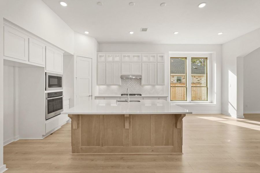 Furnished interior view inside a new home in Kresston: 55ft. lots, Magnolia (Image 11).