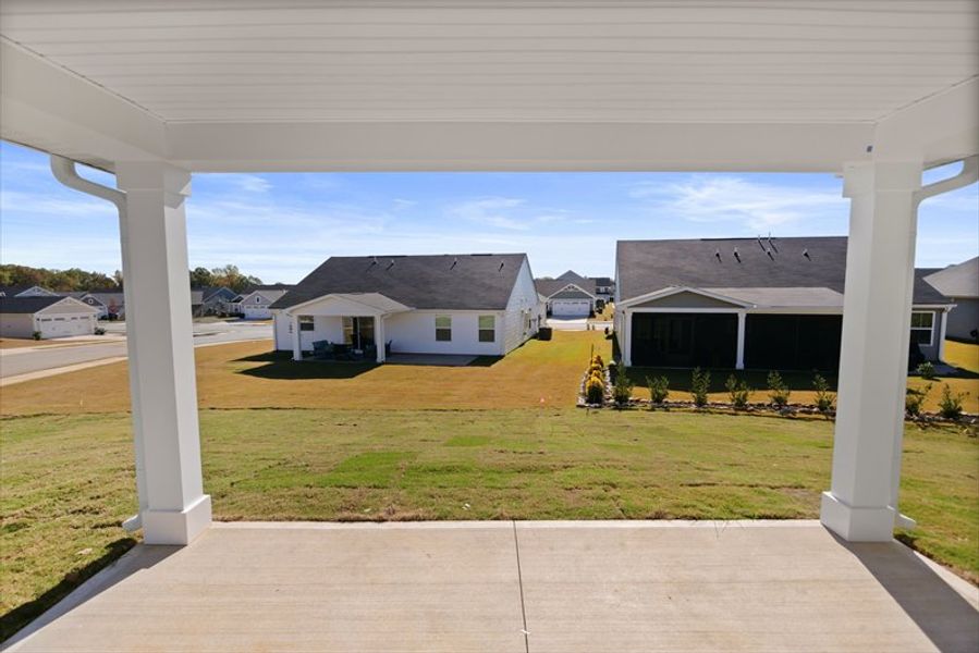 Exterior details and patio area of a home in Reidville Town Center Cottages, Duncan (Image 2).
