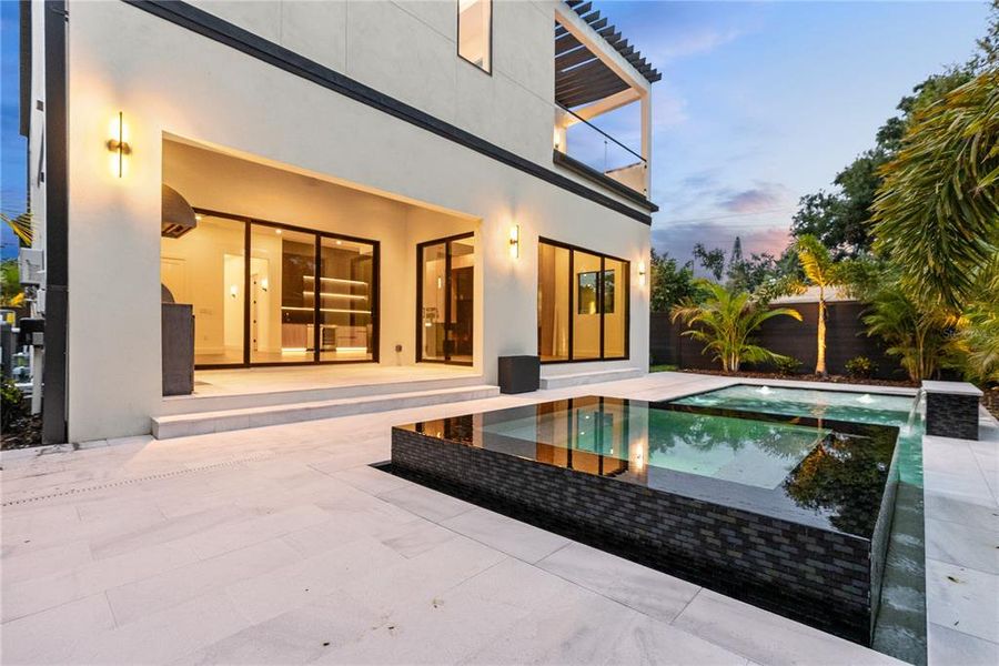 Front exterior of a new home in , Tampa, FL, highlighting curb appeal (Image 1). Front exterior of a new home in , Tampa, FL, highlighting curb appeal (Image 1).