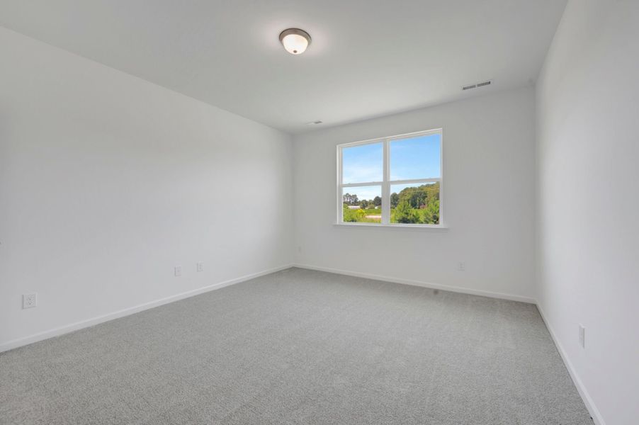 Spacious, unfurnished interior of a new home in Providence Creek, Fuquay Varina (Image 27).