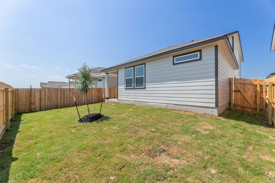 Exterior details and patio area of a home in Highland Ridge, New Braunfels (Image 3).