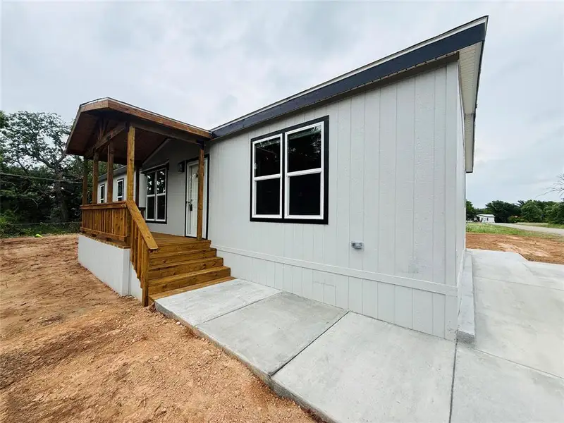 Exterior details and patio area of a home in , Granbury (Image 17).