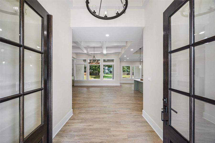 As you walk in you are greeted by a beautiful open concept living family room, with tons of natural light, and luxury vinyl flooring that flows seamless throughout this home.