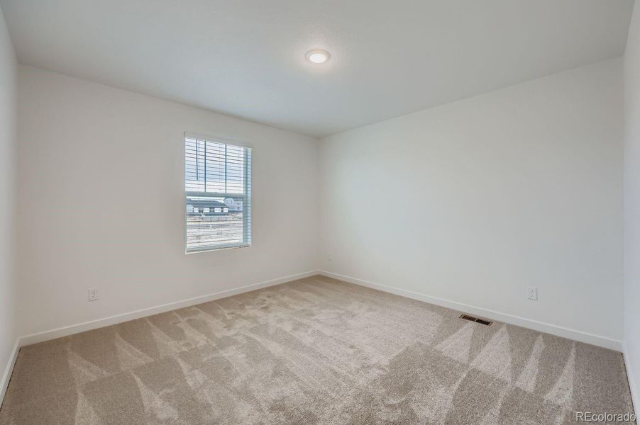 Spacious, unfurnished interior of a new home in Percheron: The Explorer Collection, Colorado Springs (Image 10).