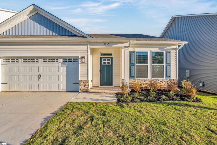 Front exterior of a new home in Halton Oaks, Spartanburg, SC, highlighting curb appeal (Image 21).