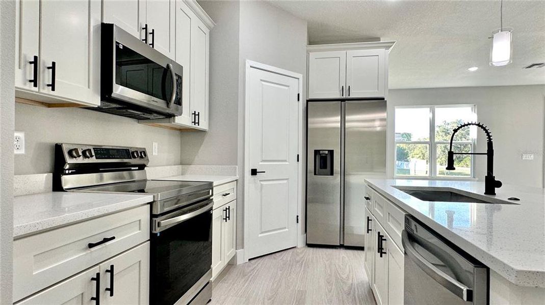 Furnished interior view inside a new home in , Poinciana (Image 10).