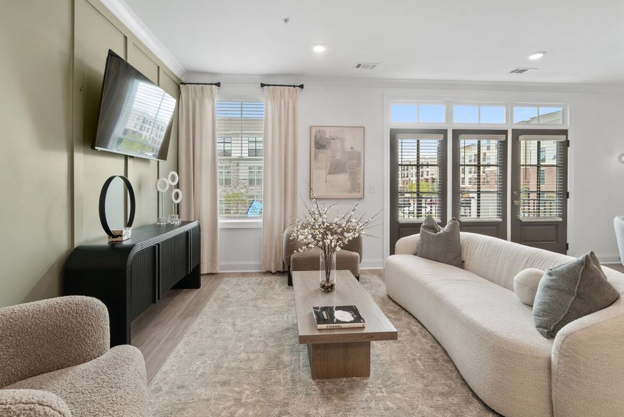 Representative furnished interior of a home built from the The Oleander by The Providence Group in Market Square at Sawnee Village, Cumming (Image 14).