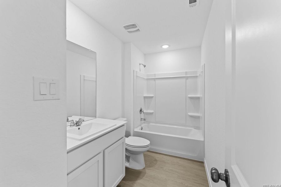 Furnished interior view inside a new home in Waterwheel, San Antonio (Image 7).