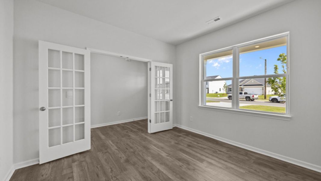 Spacious, unfurnished interior of a new home in East Ridge, Ayden (Image 14).