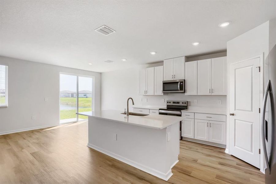 Furnished interior view inside a new home in Salt Meadows - Classic Series, Parrish (Image 10).