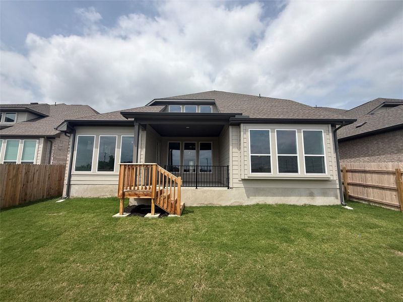Rear of Home and Private Backyard